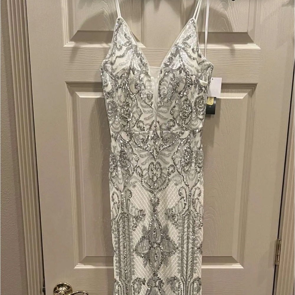 Betsy Adam’s White Formal Gown